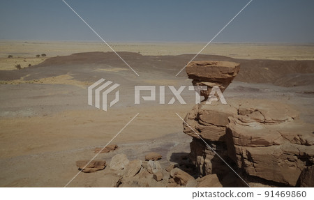 Rock formation at Sahara desert near Tchirozerine region, Agadez, Niger Rock formation at Sahara desert near Tchirozerine region, Agadez, Niger 91469860