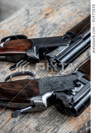 Detail Of Open Hunting Rifles Laying On Table Detail Of Open Hunting Rifles Laying On Table 91473838