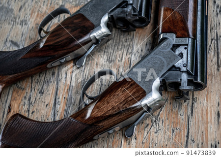 Detail Of Open Hunting Rifles Laying On Table Detail Of Open Hunting Rifles Laying On Table 91473839