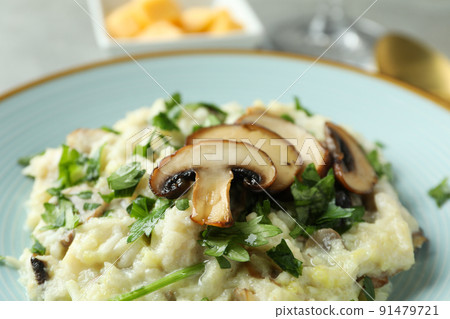 Concept of tasty food with risotto with mushrooms, close up 91479721