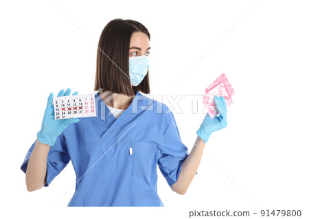 Trainee nurse with pads and period calendar isolated on white background 91479800