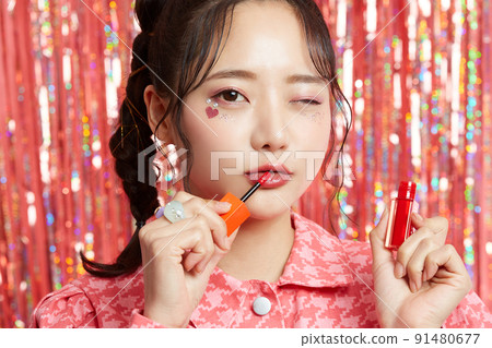 Beauty portrait of young woman with sticker make-up glitter background 91480677