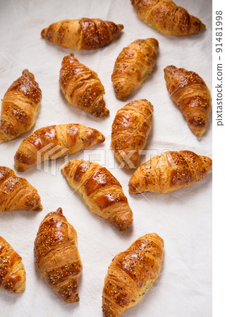 croissants on a white fabric croissants on a white fabric 91481998