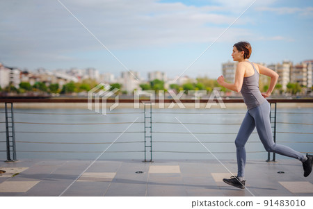 outdoor sports, workout and wellness concept. 91483010