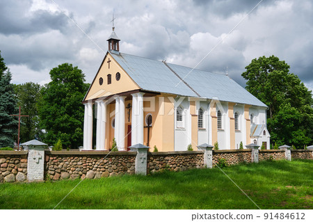Old ancient catholic church of the Transfiguration of the Lord in classicism style. Malaya Mysh village, Baranovichi district, Brest region, Belarus. 91484612