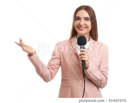 Young female journalist with microphone on white background Young female journalist with microphone on white background 91485978