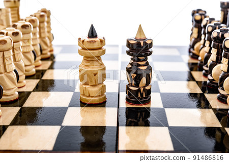 Beige Brown Wooden chess different pieces figures standing on chessboard. Closeup game concept competition, Classic Tournament. 91486816