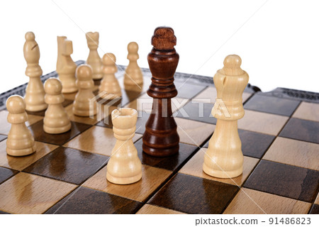 Beige Brown Wooden chess different pieces figures standing on chessboard. Closeup game concept competition, Classic Tournament. Beige Brown Wooden chess different pieces figures standing on chessboard. Closeup game concept competition, Classic Tournament. 91486823