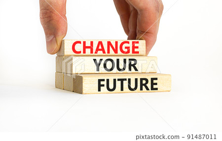 Change your future symbol. Concept words Change your future on wooden blocks on a beautiful white table white background. Businessman hand. Business, finacial and change your future concept. Copy 91487011