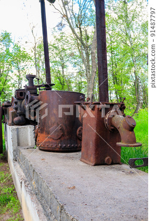 Old steaming threshing machine in Open air Museum of Folk Architecture and Folkways of Middle Naddnipryanschina in Pereyaslav, Ukraine 91487797