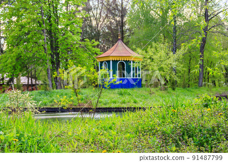 Small wooden gazebo in Pereyaslav, Ukraine 91487799