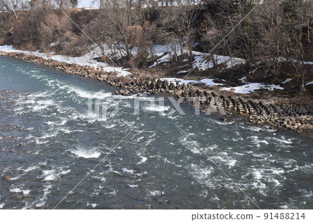 Snow melting scenery in heavy snowfall area Snow melting scenery in heavy snowfall area 91488214