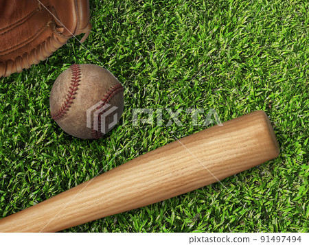 baseball, glove, ball and bat on field baseball, glove, ball and bat on field 91497494