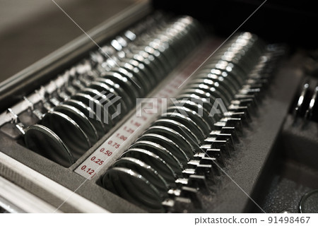 Test glasses phoropter with lens set for eye vision testing or examinations in clinic - refractor used for eye exam 91498467