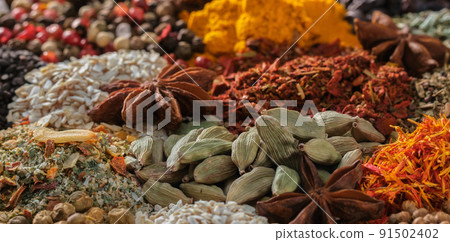 Spices. Aromatic Indian spices on a slate background. Spices and herbs on stone 91502402