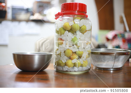 Making plum syrup 91505808