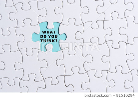 White jigsaw puzzle with words over blue background - What do you think. White jigsaw puzzle with words over blue background - What do you think. 91510294