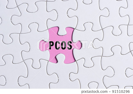 PCOS text on white jigsaw puzzle over pink background. Health Care concept. PCOS text on white jigsaw puzzle over pink background. Health Care concept. 91510296