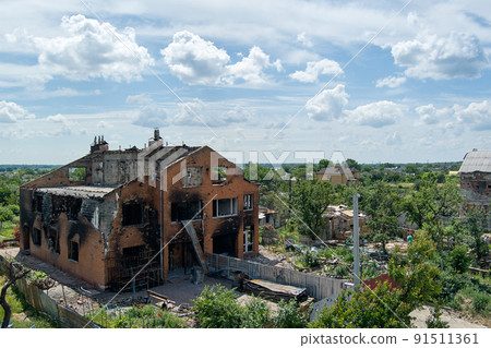 Damaged ruined houses in Chernihiv near Kyiv on north of Ukraine 91511361