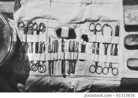 Old Medical And Surgical Instruments. Many Surgical Instruments For Surgery. Old Different Metal Medical Instruments Objects. Retro Stainless Surgical Equipment Tools. Black And White Toned Shot. Old Medical And Surgical Instruments. Many Surgical Instruments For Surgery. Old Different Metal Medical Instruments Objects. Retro Stainless Surgical Equipment Tools. Black And White Toned Shot. 91513638