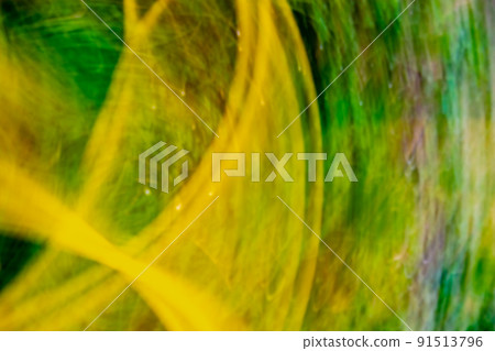 Radiation abstraction. Acid yellow green background. 91513796
