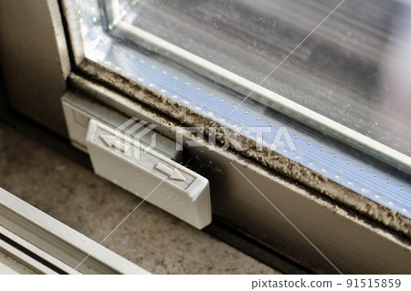 A large amount of black mold is occurring on indoor windows, sashes, and window frames. A large amount of black mold is occurring on indoor windows, sashes, and window frames. 91515859