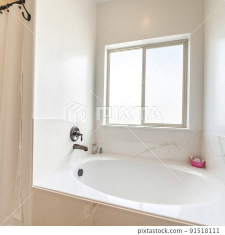 Square frame Small space interior of a white bathroom with window 91518111