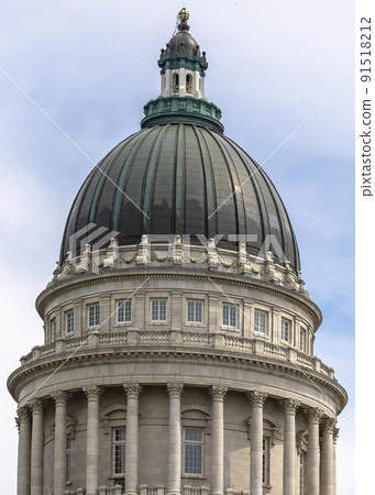 Vertical Famous landmark Utah State Capital Building against cloudy sky in Salt Lake City 91518212