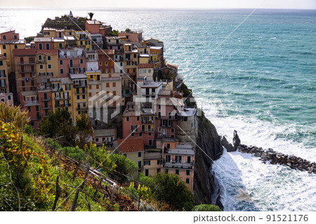 Colorful Manarola in Cinque Terre at the Italian coast 91521176