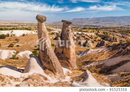 Rocky landscape in Cappadocia at sunset, Turkey. Rocky landscape in Cappadocia at sunset, Turkey. 91525358