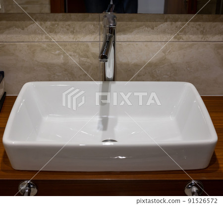 Bathroom sink. Stylish white sink in modern bathroom interior 91526572