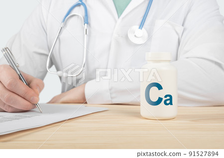 Essential supplement calcium Ca for bone humans. doctor recommends taking calcium. doctor talks about Benefits of calcium. Calcium - Bone Health Concept Essential supplement calcium Ca for bone humans. doctor recommends taking calcium. doctor talks about Benefits of calcium. Calcium - Bone Health Concept 91527894