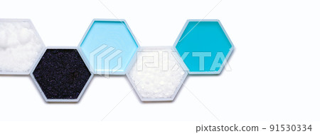 Chemical ingredient in hexagonal molecular shaped container. Sodium Hydroxide Pellets, Potassium Permanganate, Hair Conditioner, Polyethylene and Shampoo Liquid. Chemical ingredient in hexagonal molecular shaped container. Sodium Hydroxide Pellets, Potassium Permanganate, Hair Conditioner, Polyethylene and Shampoo Liquid. 91530334