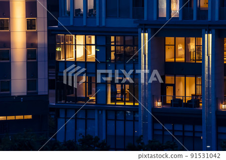 View outside the window of a luxury building at night 91531042