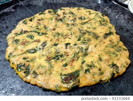 Palak paratha or Indian flat breads made from spinach and served with mango pickle and mint dip, Indian breakfast Palak paratha or Indian flat breads made from spinach and served with mango pickle and mint dip, Indian breakfast 91531668