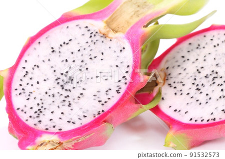 Dragon fruit cactus fruit cut cross section bright background Dragon fruit cactus fruit cut cross section bright background 91532573