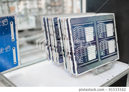 Manufacturing of printed circuit boards in production. Just made batch of printed circuit boards for Manufacturing of printed circuit boards in production. Just made batch of printed circuit boards for 91533582