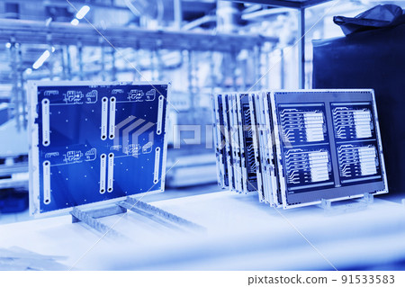 Process of creating a printed circuit board. printed circuit board in production. Just made batch of 91533583
