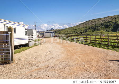 The new parking lot at Murder Hole beach, officially called Boyeeghether Bay starts at the camping site County Donegal, Ireland The new parking lot at Murder Hole beach, officially called Boyeeghether Bay starts at the camping site County Donegal, Ireland 91534067