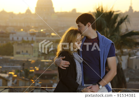 portrait of loving couple embracing in Rome, Italy. aticano is on background portrait of loving couple embracing in Rome, Italy. aticano is on background 91534381