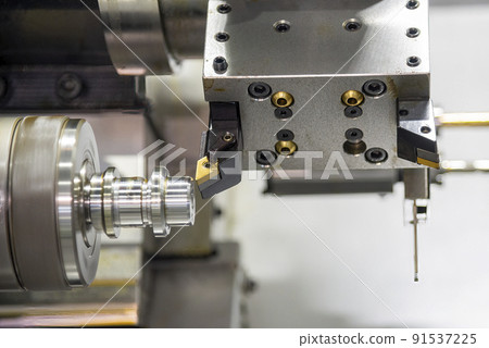 The  dual spindle type CNC lathe machine forming cutting the metal shaft parts. 91537225