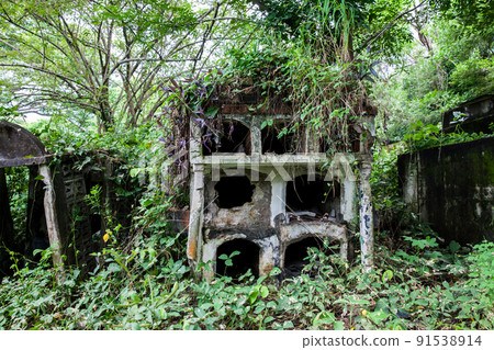 Desecrated graves in the cemetery of the old town of Armero destroyed by an avalanche caused by the Nevado del Ruiz Volcano in 1985 in Colombia 91538914