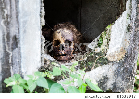 Desecrated graves in the cemetery of the old town of Armero destroyed by an avalanche caused by the Nevado del Ruiz Volcano in 1985 in Colombia 91538918