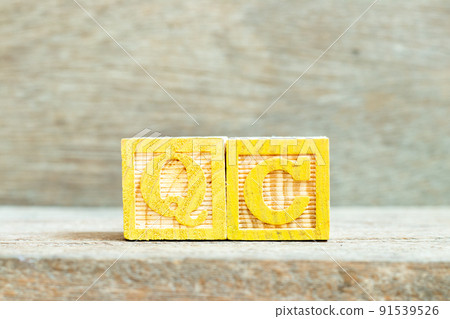 Color alphabet letter block in word QC (Abbreviation of Quality Control) on wood background Color alphabet letter block in word QC (Abbreviation of Quality Control) on wood background 91539526