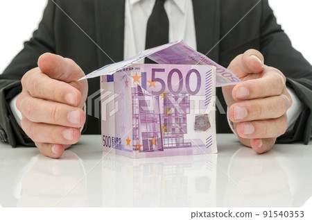 Male hands around money house 91540353