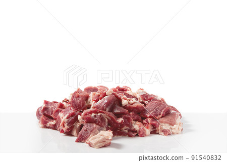 Fresh fine Raw pork meat pile isolated on white background. pile of chopped pork meat. Fresh fine Raw pork meat pile isolated on white background. pile of chopped pork meat. 91540832
