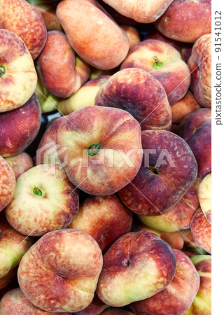 Fresh Organic Flat Peaches Heap Of Fresh Ripe Peaches At Market. Fresh Organic Flat Peaches Heap Of Fresh Ripe Peaches At Market. 91541012