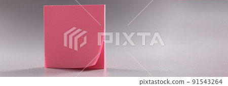 Closeup of pink stickers on gray background Closeup of pink stickers on gray background 91543264