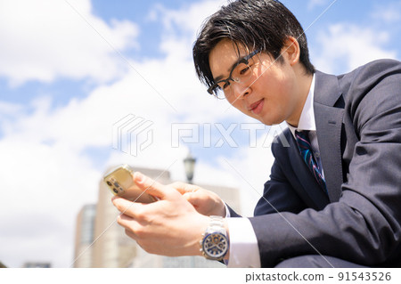 Portrait of a man who is addicted to social games Savory man 91543526