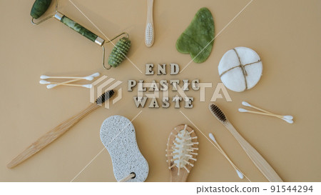 END PLASTIC WASTE text around Natural skin care products on neutral beige background, flat lay. Concept of organic, zero waste, eco friendly cosmetics Spa Background Sustainable lifestyle END PLASTIC WASTE text around Natural skin care products on neutral beige background, flat lay. Concept of organic, zero waste, eco friendly cosmetics Spa Background Sustainable lifestyle 91544294